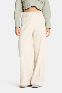 Pantalon fluide ajusté Cambio Anais à nouer devant avec ourlet glacé