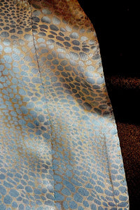 TC Sports veste Moka/Gold, doublure léopard bleu sarcelle