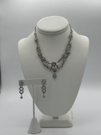 Ensemble collier et boucles d'oreilles Elen Henderson motif fleur