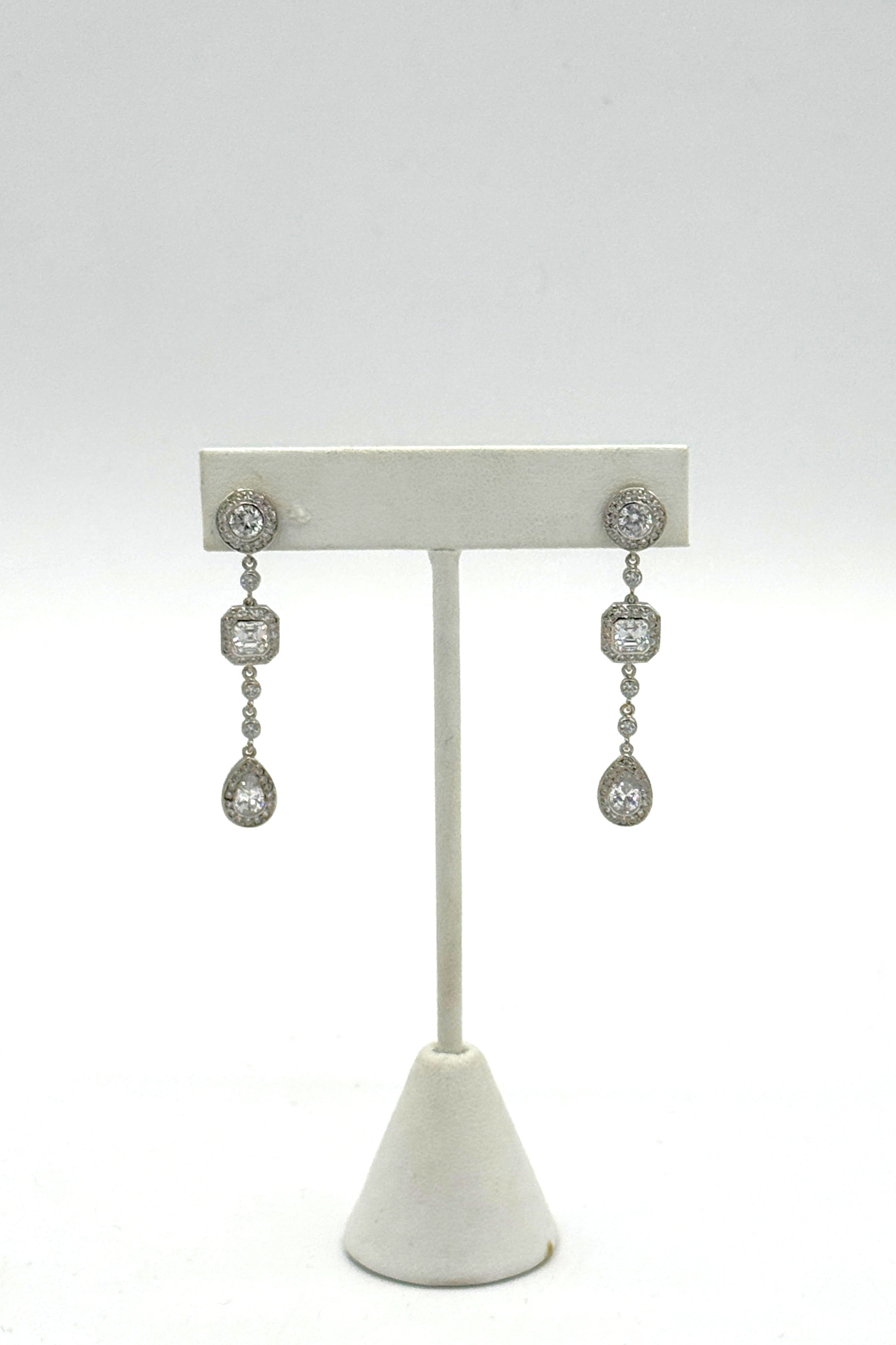Tres Chic Crystal Drop Earrings With Halo Settings
