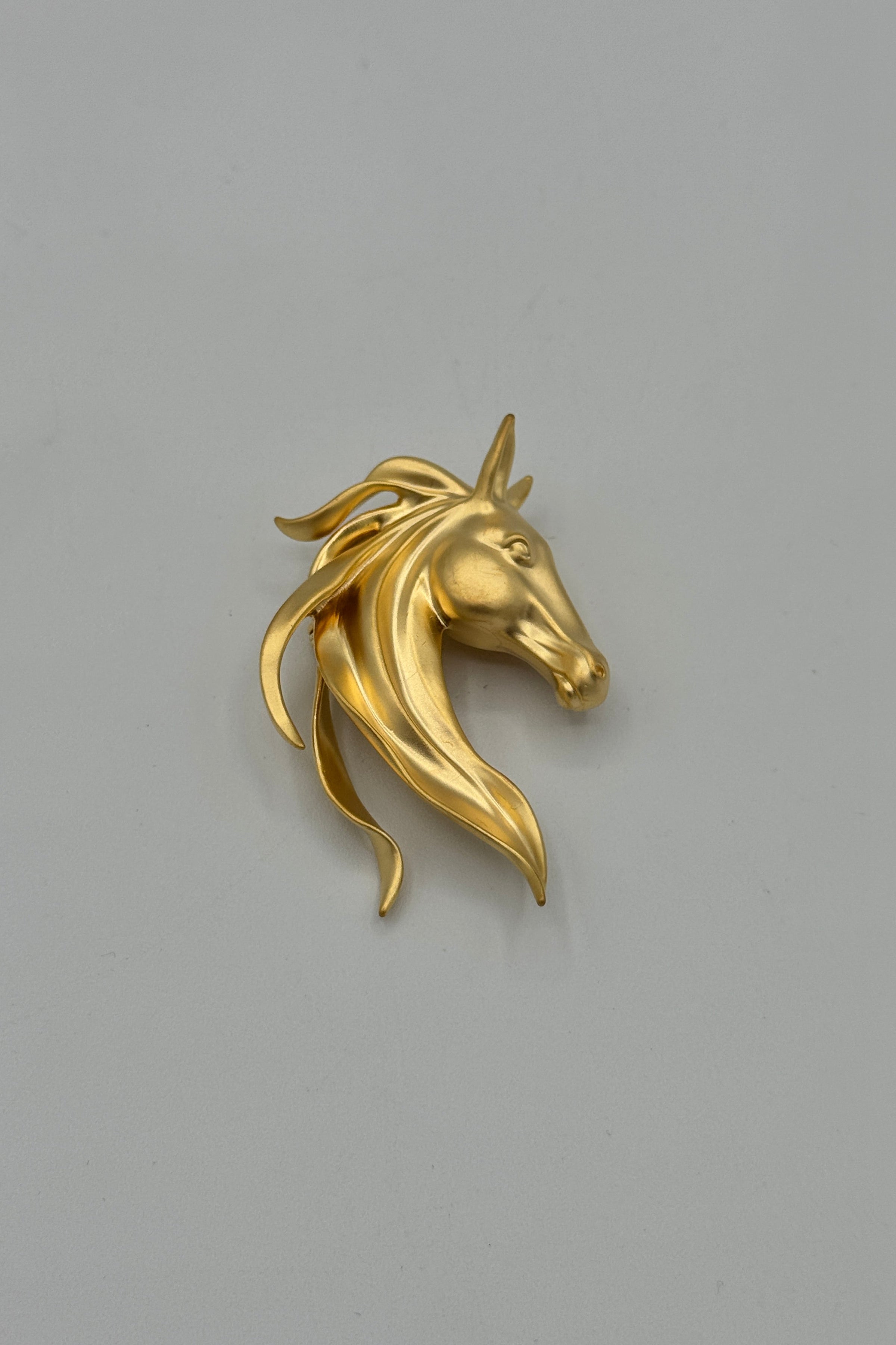 Broche cheval or Tres Chic